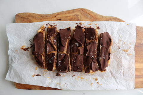 Chocolate Covered Date Caramel Squares with Puffed Rice and Peanut Butter